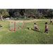 Children in a field playing soccer using Powernet Soccer Goal 8x4 Portable Bow Style Net S002