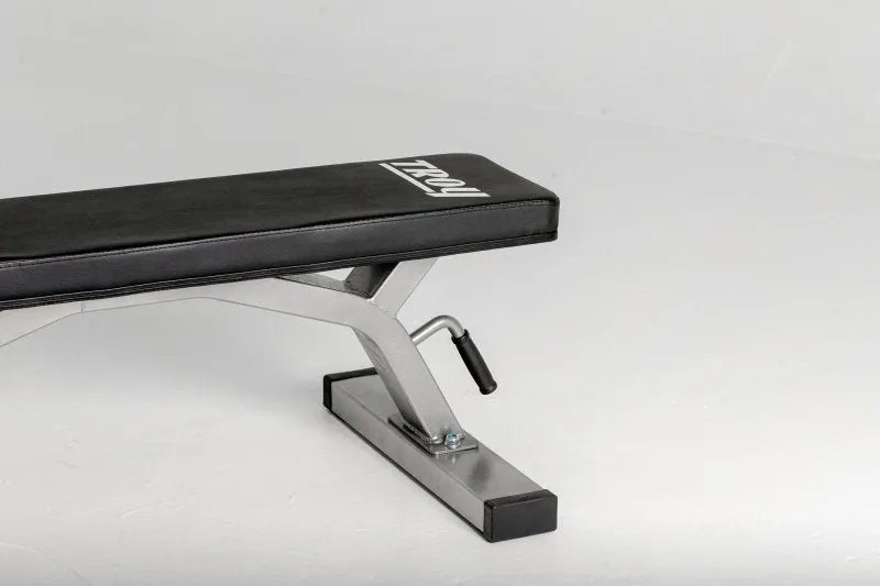 Troy Flat Bench - long shot view of bench with handle grip and steel gauge frame