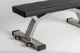 Troy Flat Bench - view of steel gauge frame with built-in wheels