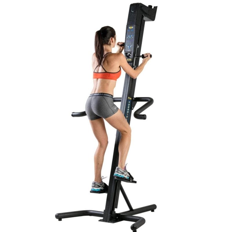 VersaClimber SMA Sport Model Vertical Climber - a woman on a machine