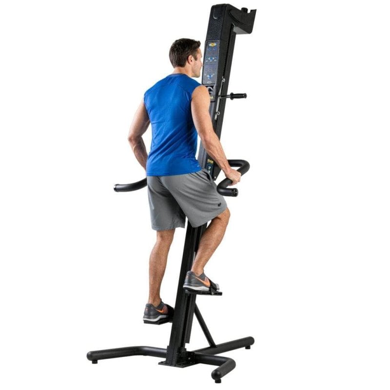 VersaClimber SMA Sport Model Vertical Climber - a man on a exercise machine