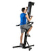 VersaClimber SMA Sport Model Vertical Climber - a man in blue top working out