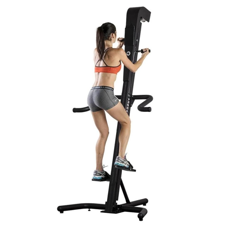 VersaClimber TSA Commercial Vertical Climber - A woman on an exercise machine