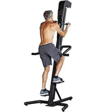 VersaClimber TSA Commercial Vertical Climber - a man climbing on machine