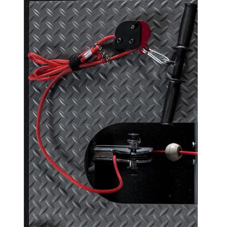 VersaClimber VersaPulley Squat Deck - a metal plate with a red rope attached to it