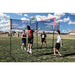 Powernet Volleyball Four Square Net in a field used by four people playing volleyball