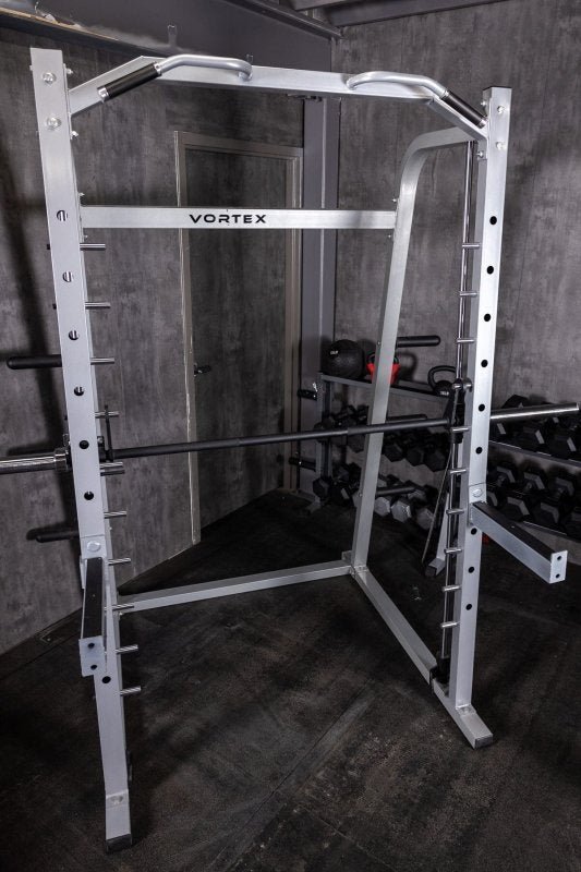 Vortex Strength SMVT1500 Commercial Smith Machine / Power Rack Combo - Front photo of the actual product with dumbbells placed behind it