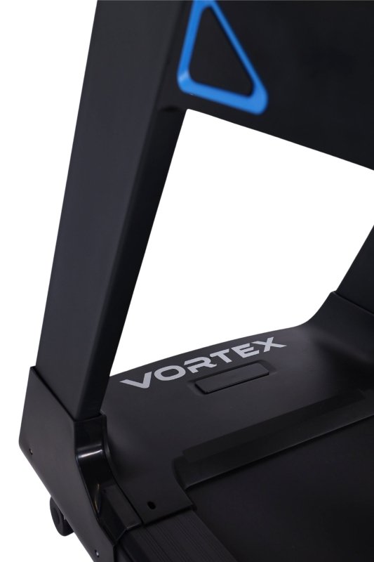 Vortex Strength VT5000 Commercial Treadmill with Integrated TV - Foot rail and  walking belt side photo