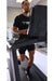 Vortex Strength VT5000 Commercial Treadmill with Integrated TV - Man working out while looking at the  monitor