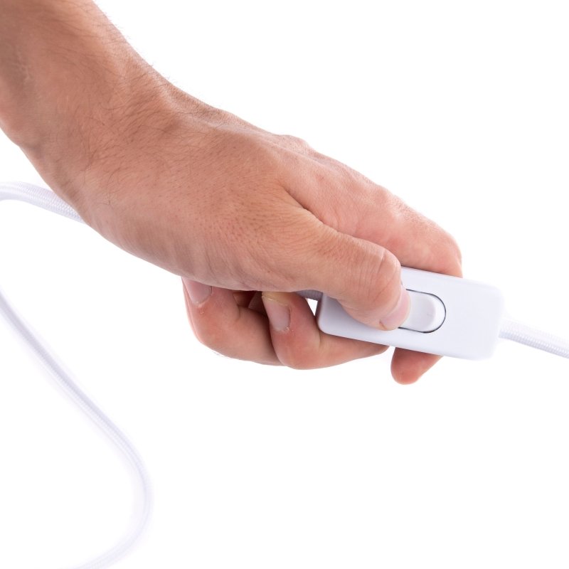 Yellow LED Light Therapy - hand holding a switch