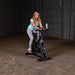 Body-Solid Endurance Spin Bike ESB250 - woman sitting and working out