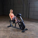 Body-Solid Endurance Recumbent Bike B4RB - front view of the product with woman using the bike
