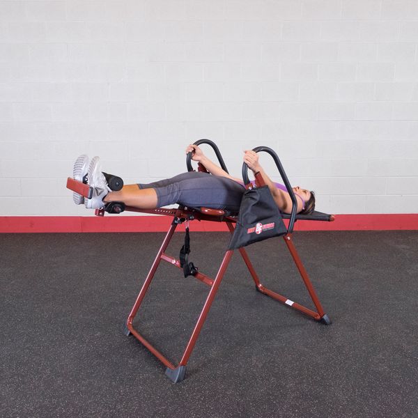 Best Fitness BFINVER10 Inversion Table - woman on gym trying out while on the table 