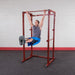 Best Fitness BFPR100 Power Rack - Man on pull up and vertical knee position 