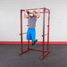 Best Fitness BFPR100 Power Rack - Man pulled up in front position 