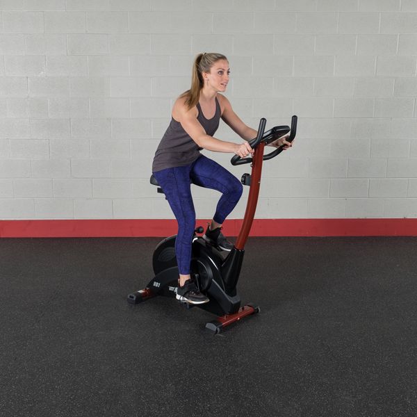 Best Fitness BFUB1 Upright Bike - woman sitting and trying out to the product 