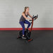 Best Fitness BFUB1 Upright Bike - woman sitting and trying out to the product 