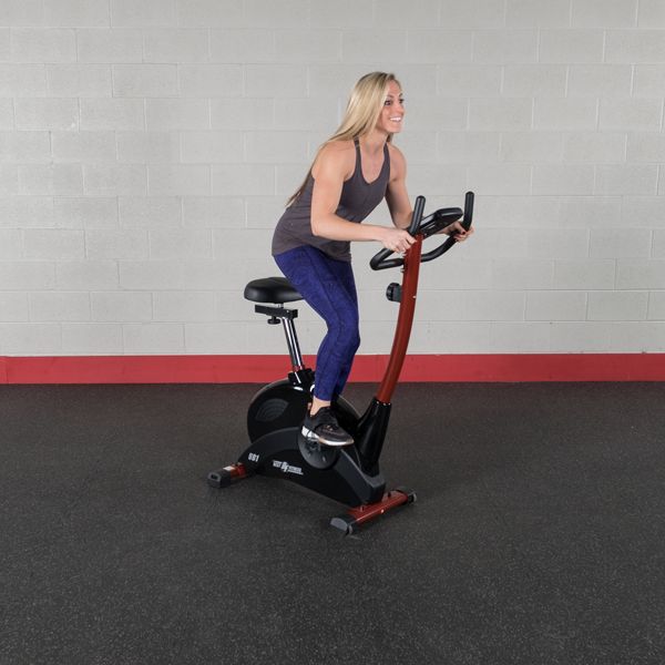 Best Fitness BFUB1 Upright Bike - woman slightly standing while on cardio