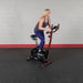 Best Fitness BFUB1 Upright Bike - woman slightly standing while on cardio