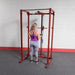 Best Fitness Lat Attachment for BFPR100 - woman standing in arm exercise with the machine 