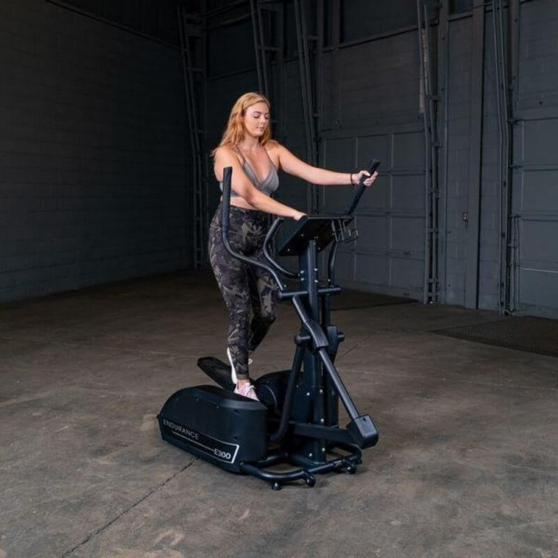 Body-Solid Endurance Center Drive Elliptical E300 - Woman exercising using E300