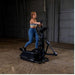 Body-Solid Endurance Center Drive Elliptical E300 - Woman doing cardio exercise