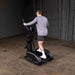 Body-Solid Endurance Center Drive Elliptical E400 - Man doing cardio