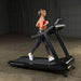 Body-Solid Endurance Commercial Treadmill T150 - woman running on treadmill