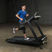 Body-Solid Endurance Commercial Treadmill T150 - Man running in treadmill