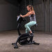 Body-Solid Endurance Upright Bike B4UB - Woman on the treadmill