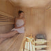 Canadian Hemlock Indoor Wet Dry Sauna with LED Lights - 4.5 kW UL Certified Heater - 4-6 Person - Woman enjoying sauna while sitting inside