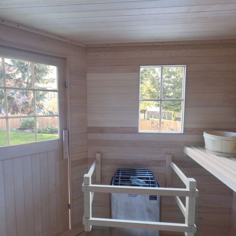 Canadian Hemlock Wet Dry Outdoor Sauna with Asphalt Roof - 8 kW UL Certified Heater - 8 Person - Window from inside view