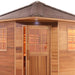 Canadian Red Cedar Wet Dry Outdoor Sauna with Asphalt Roof - 8 kW UL Certified Heater - 8 Person - Sauna door open with light above