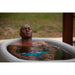 Cryospring Portable Ice Bath - a man in a pool of water