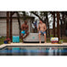 Cryospring Portable Ice Bath - two men sitting on a box next to a pool