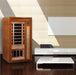 Dynamic Barcelona 1-2-Person Low EMF FAR Infrared Sauna - Set up in the living room with books on the table