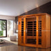 Dynamic Bergamo 4-Person Low EMF FAR Infrared Sauna - Set up in a living room with wooden walls