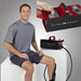 Game Ready Ice Machine GRPro 2.1 Compression Unit - a man sitting on a white cube with a device in his hand