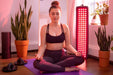 Hooga HG1000 Red Light Therapy Device - woman doing yoga