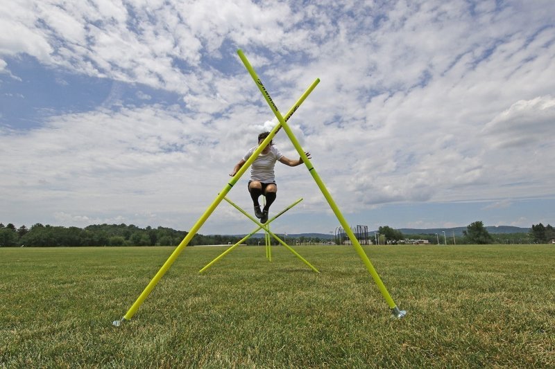 Kwik Goal Coaching Sticks 2 Go - person jumping on pole