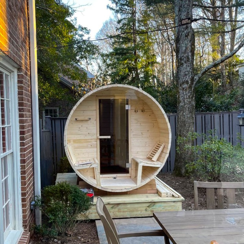 Outdoor or Indoor White Finland Pine Wet Dry Barrel Sauna - Sauna placed on backyard