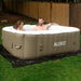 Square Inflatable Jetted Hot Tub with Cover - photo of 2 person having fun in hot tub