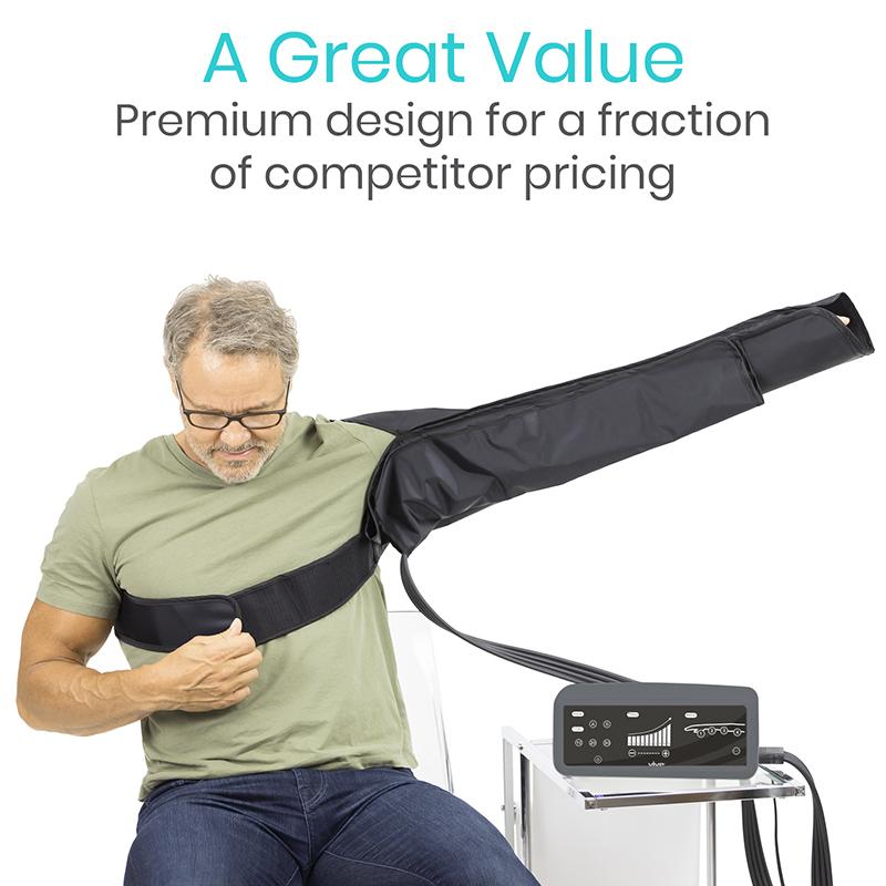 Vive Arm Compression Pump - Swelling & Pain Relief - man sitting on a chair holding his arm up while wearing arm compression